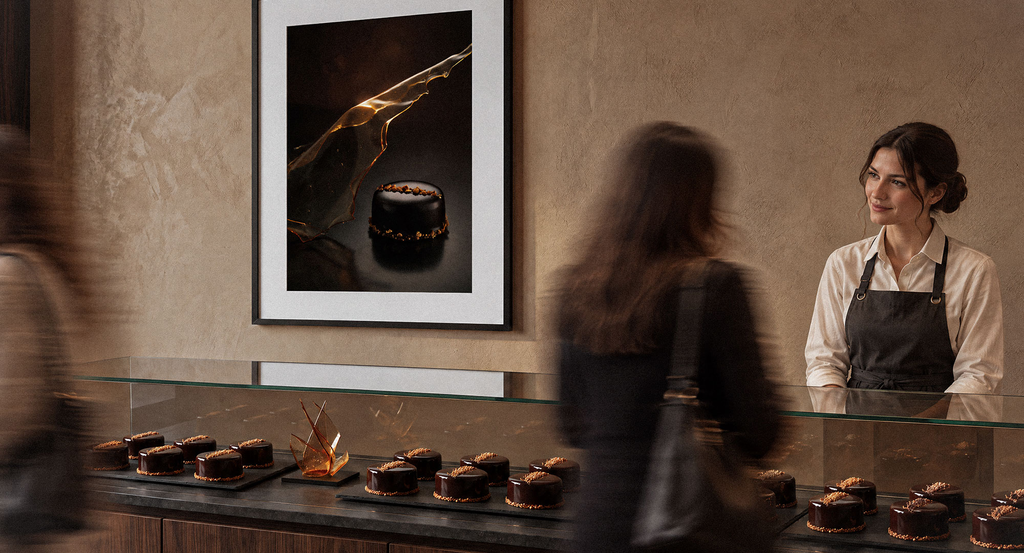 The Quiet Hour campaign artwork displayed above a pastry counter, with motion-blurred customers and an attendant behind the glass.
